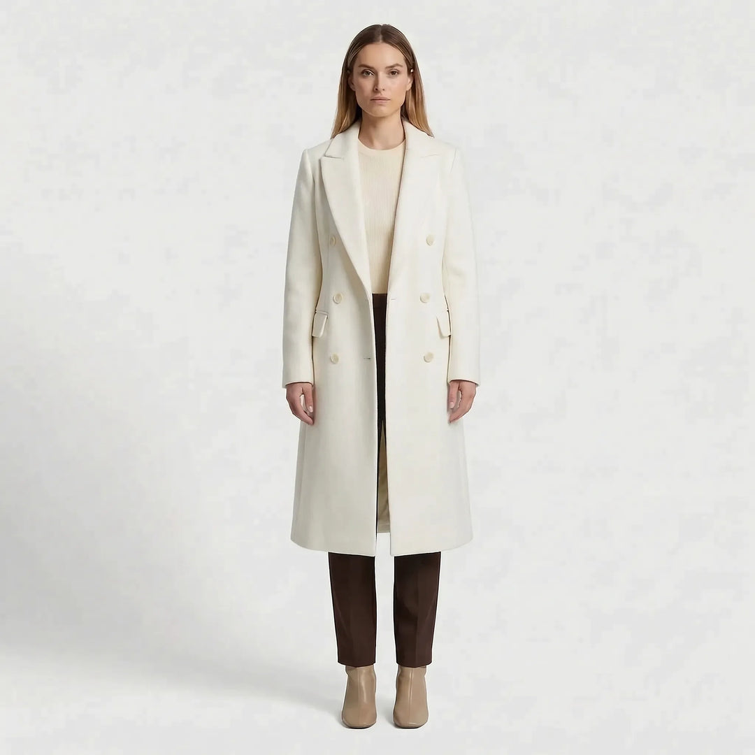 Stylowy długi płaszcz zimowy damski, klasyczny model z klapami. Elegancka odzież damska na jesień i zimę.