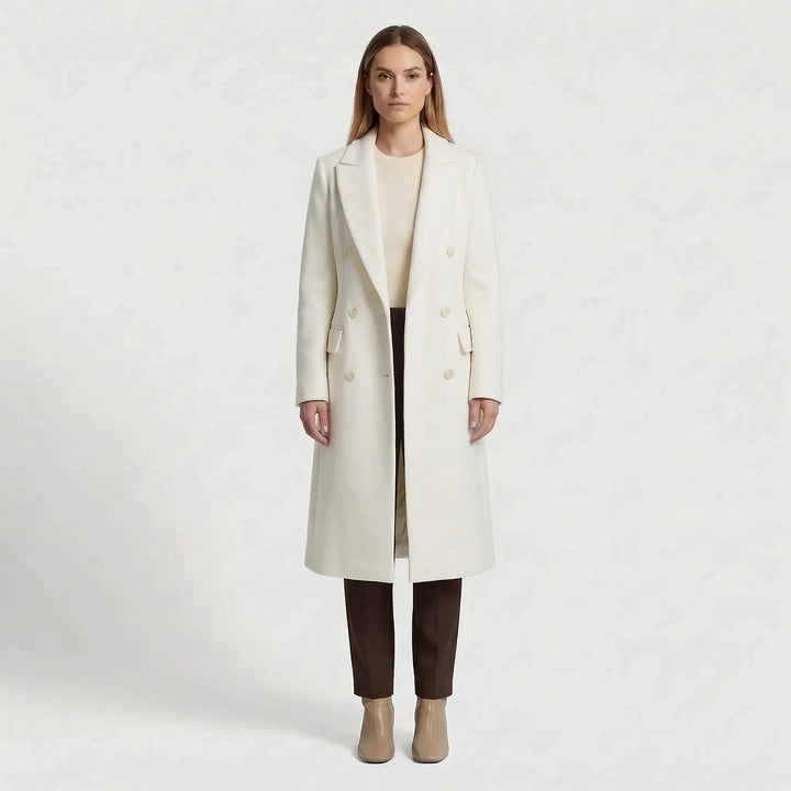 Stylowy długi płaszcz zimowy damski, klasyczny model z klapami. Elegancka odzież damska na jesień i zimę.