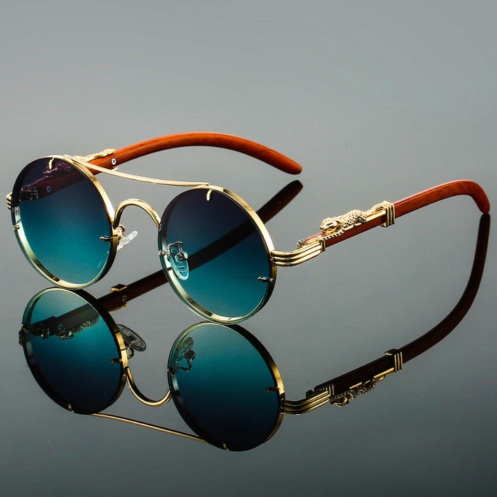 Stylowe okulary przeciwsłoneczne retro unisex z okrągłą, cienką metalową oprawą. Idealne do letnich stylizacji.