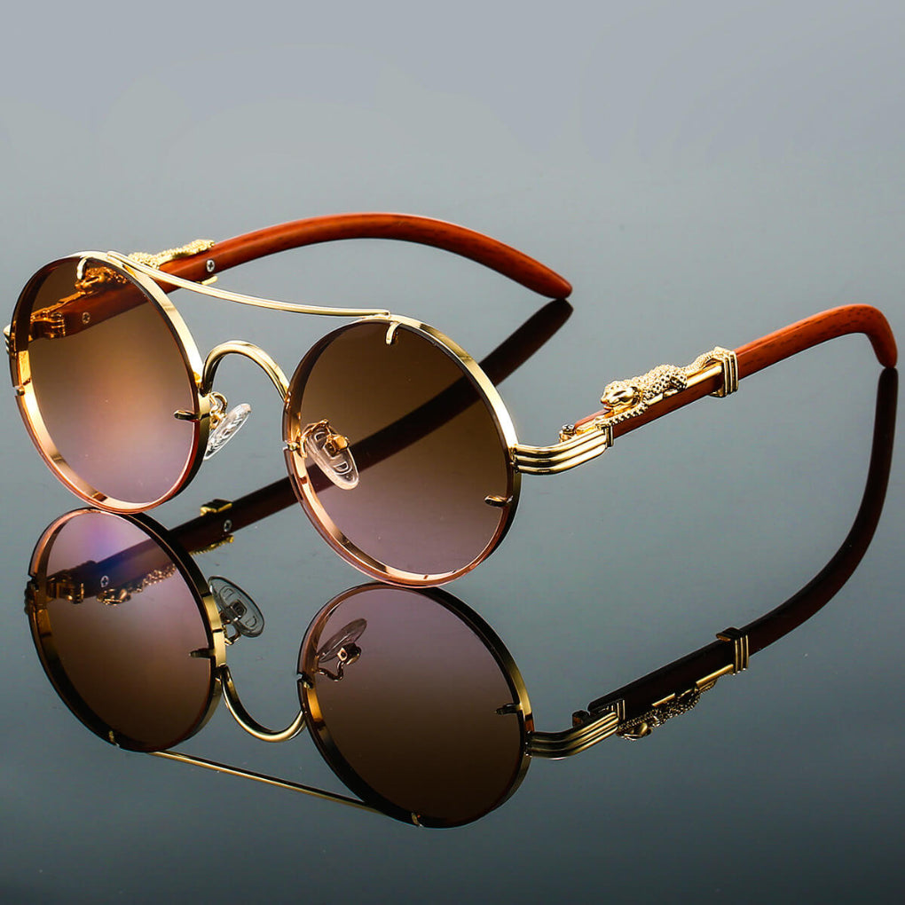 Modne okulary przeciwsłoneczne unisex w stylu retro. Lekka, metalowa oprawa i okrągłe szkła to hit tego lata.