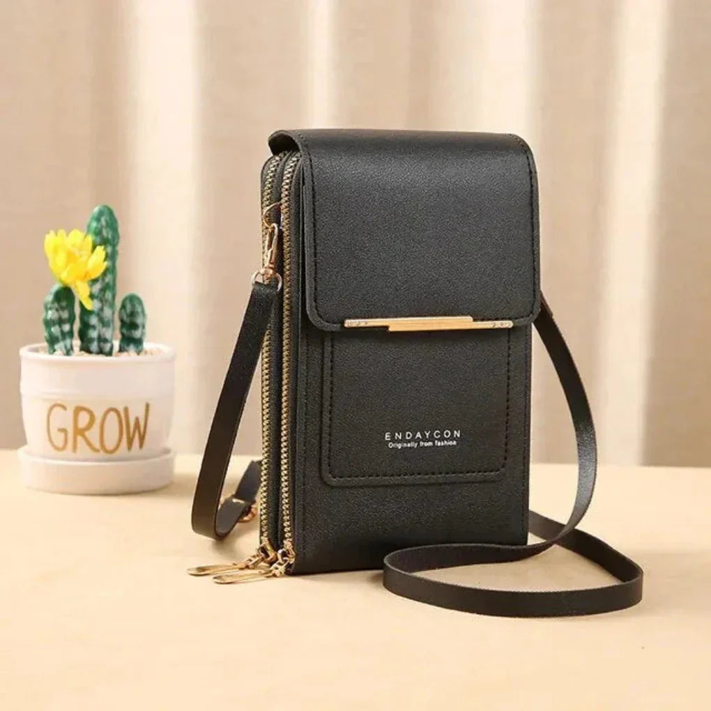Modna torebka crossbody damska z przezroczystą kieszenią na smartfon, praktyczna i stylowa.