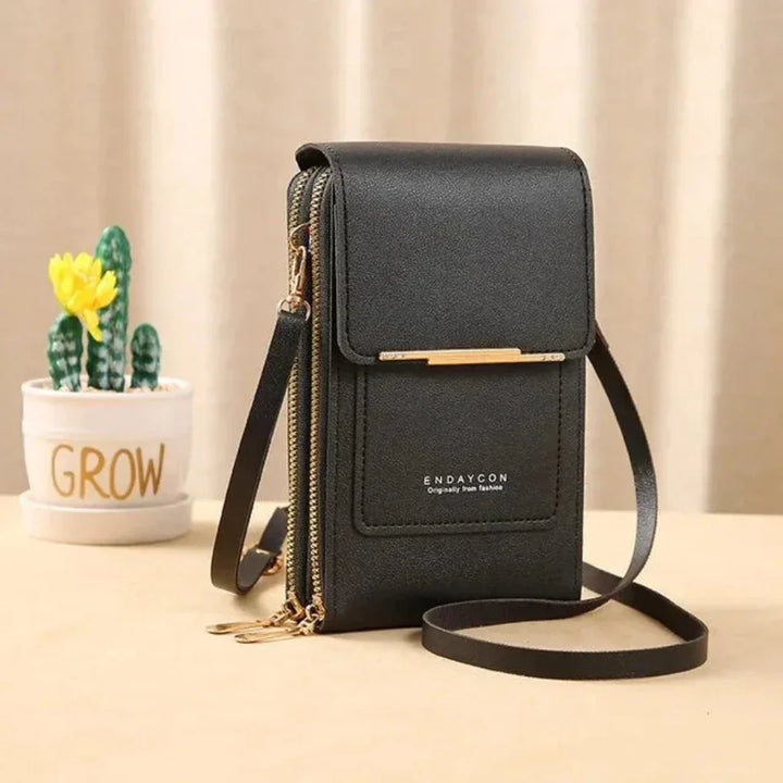 Modna torebka crossbody damska z przezroczystą kieszenią na smartfon, praktyczna i stylowa.
