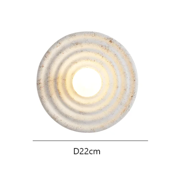 Dekoracyjna beżowa lampa ścienna okrągła 22 cm. Minimalistyczny kinkiet do nowoczesnych wnętrz. Oświetlenie.