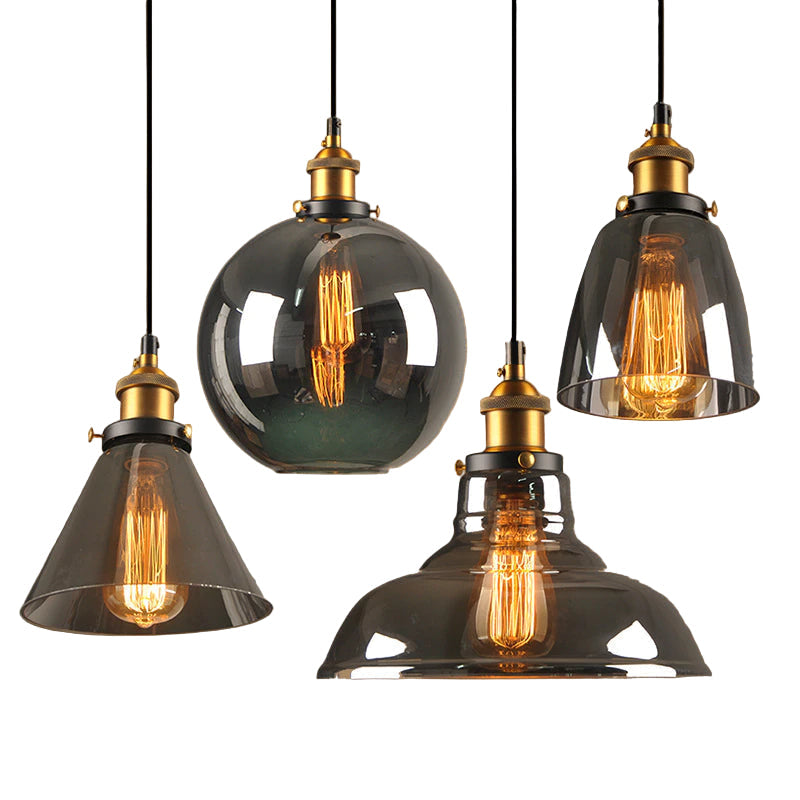 Antyczna lampa wisząca Art Déco. Bursztynowe i szare szkło, metal. Idealna do wnętrz vintage i oświetlenia sufitowego.