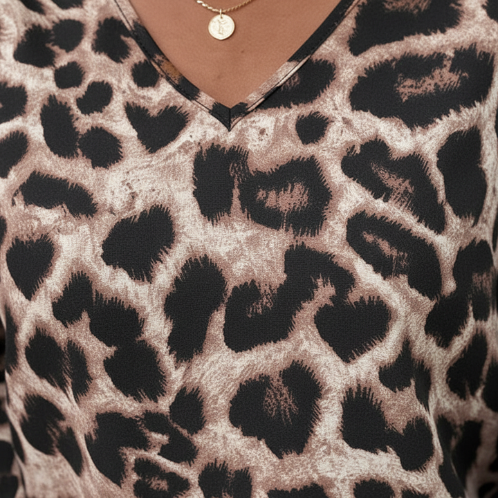 Modna bluzka damska Sabine z długim rękawem. Stylowy top na co dzień i eleganckie okazje. Komfortowy fason.