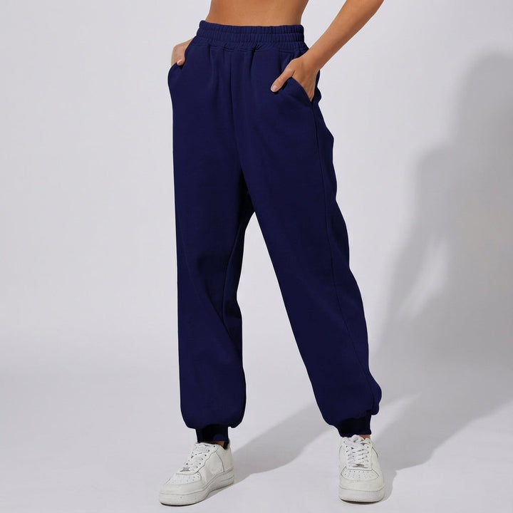 Damskie spodnie dresowe w stylu casual, luźne, zapewniające wygodę przez cały dzień.