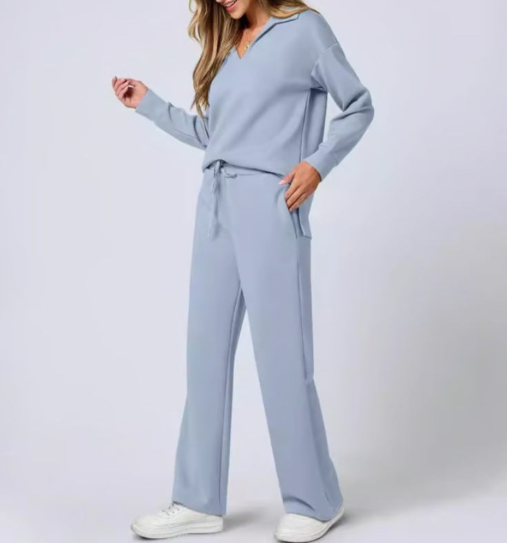 Bluza z suwakiem i szerokie spodnie w damskim casualowym komplecie. Modny i praktyczny zestaw.