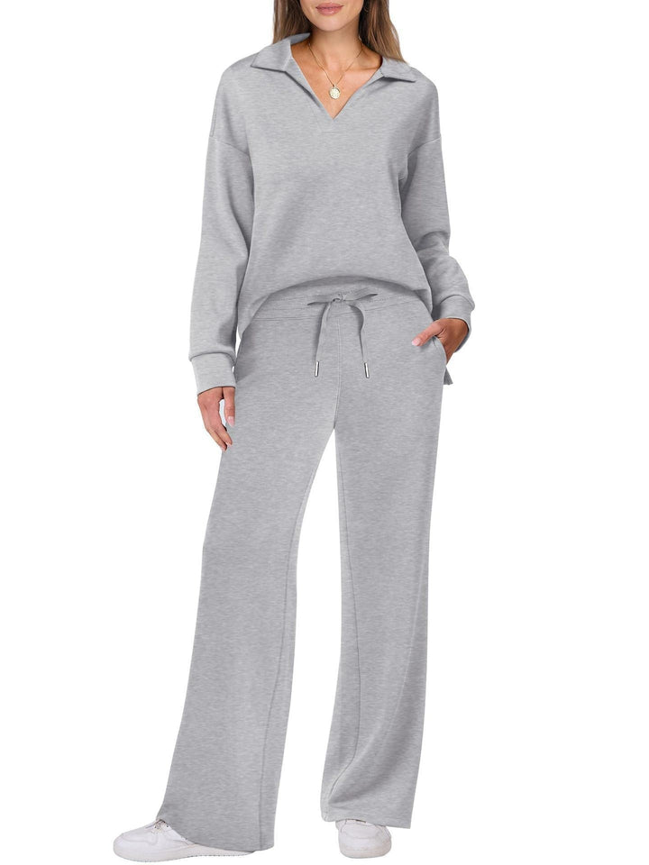 Bluza na zamek i szerokie spodnie - damski komplet casualowy. Modny element garderoby.