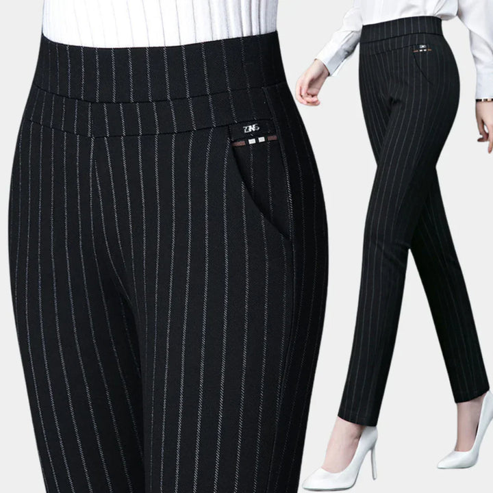 Czarne damskie spodnie z wysokim stanem, wygodne i elastyczne. Komfortowy stretch na co dzień i eleganckie okazje.
