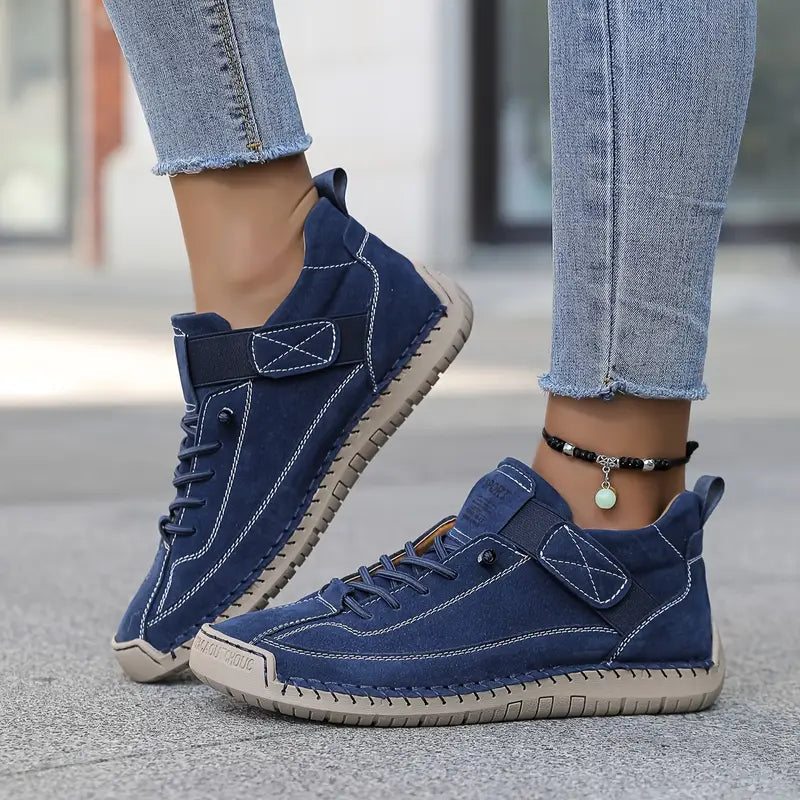 Komfortowe buty damskie z profilowaną wkładką, idealne przy płaskostopiu, zapewniające stabilność i wygodę.