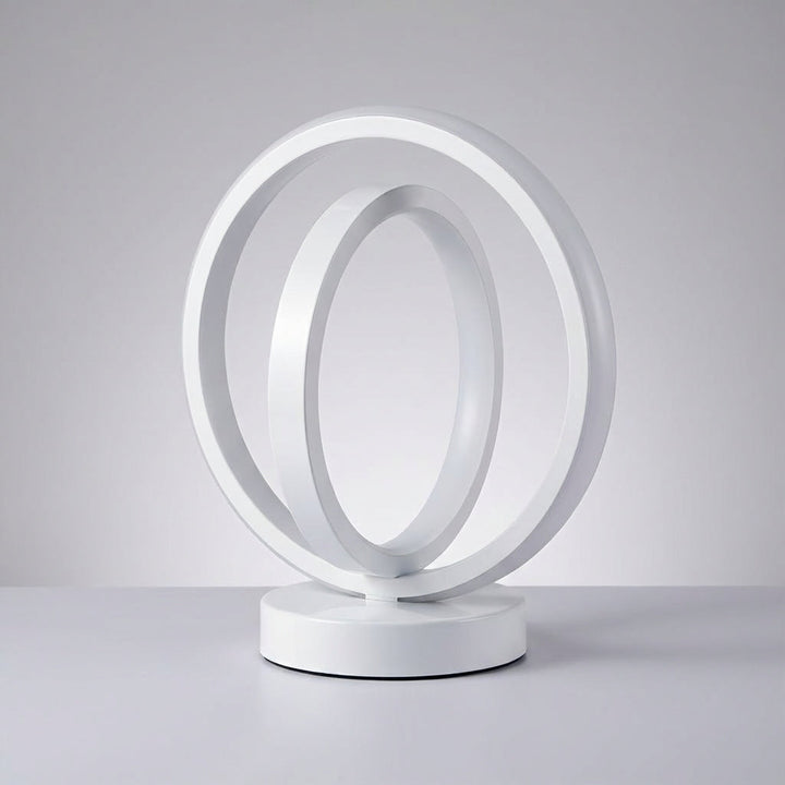 Stylowa lampa stołowa AuraLoop do biura. Okrągłe oświetlenie LED akcentowe, dodające nowoczesności Twojej przestrzeni.