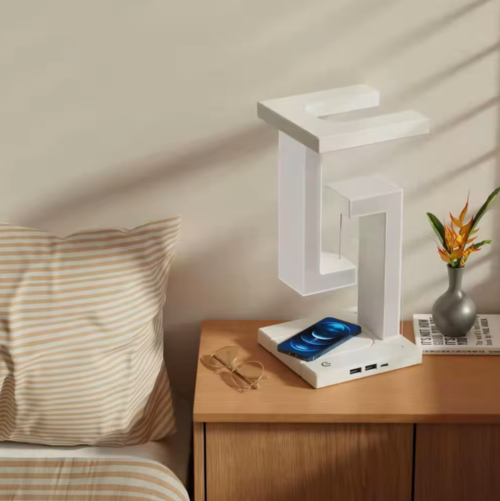 Stylowa lampa stołowa LED z lewitującą żarówką, wbudowaną ładowarką bezprzewodową i dotykowym sterowaniem.