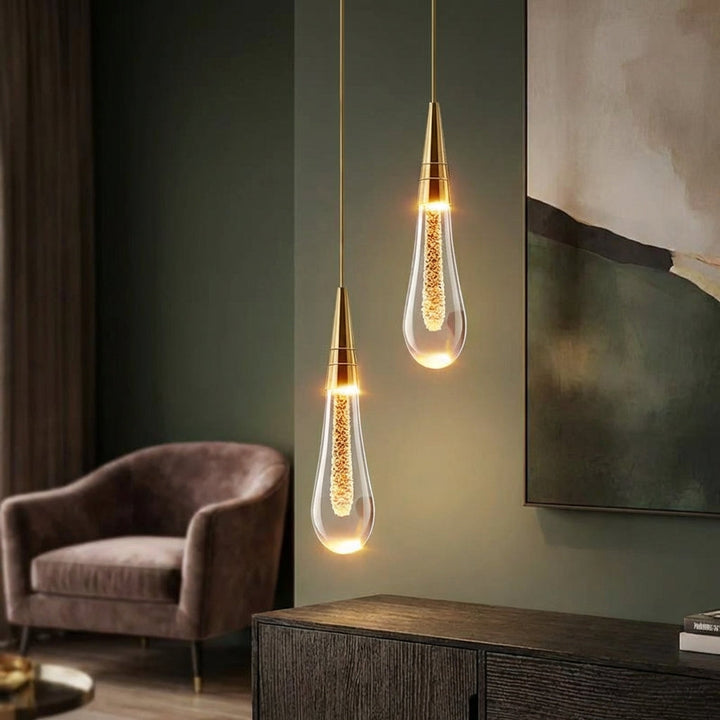 Nowoczesna lampa wisząca szklana Kropla, idealna do salonu. Wielopunktowe oświetlenie dekoracyjne.