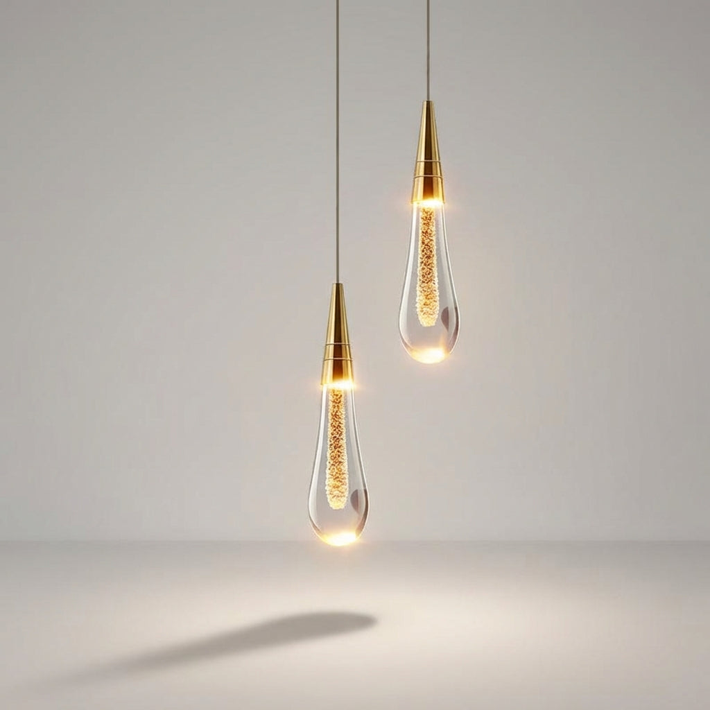 Elegancka lampa wisząca szklana typu kropla. Nowoczesne oświetlenie dekoracyjne do jadalni lub salonu.