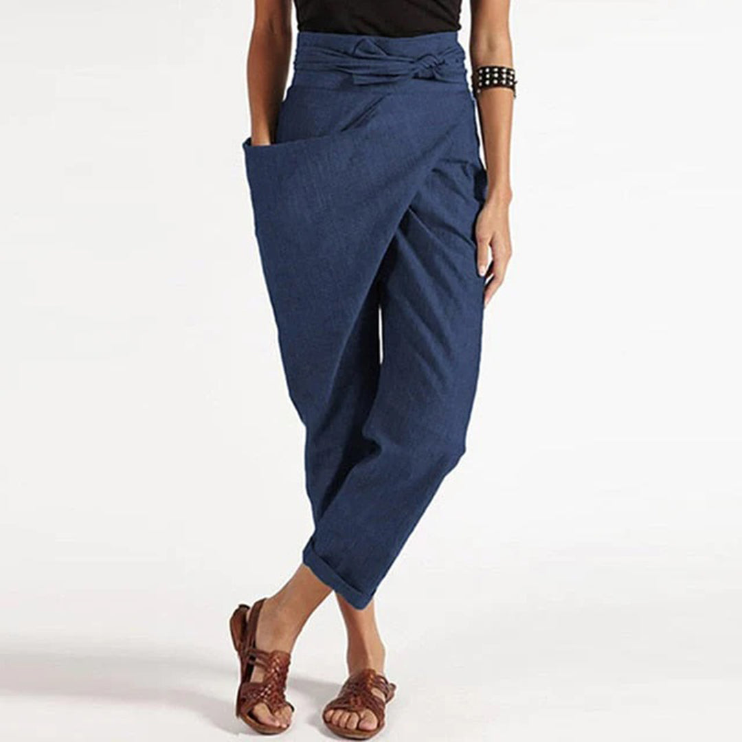 Modne letnie spodnie damskie o luźnym kroju i wysokim stanie, must-have do casualowych stylizacji.