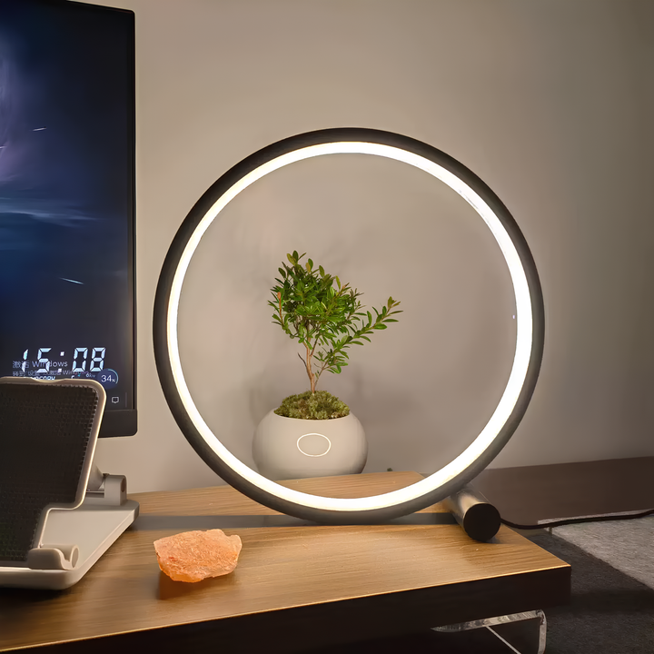 Lampa stołowa LED ze ściemniaczem, nowoczesna, okrągła. Emituje ciepłą biel światła. Do sypialni.
