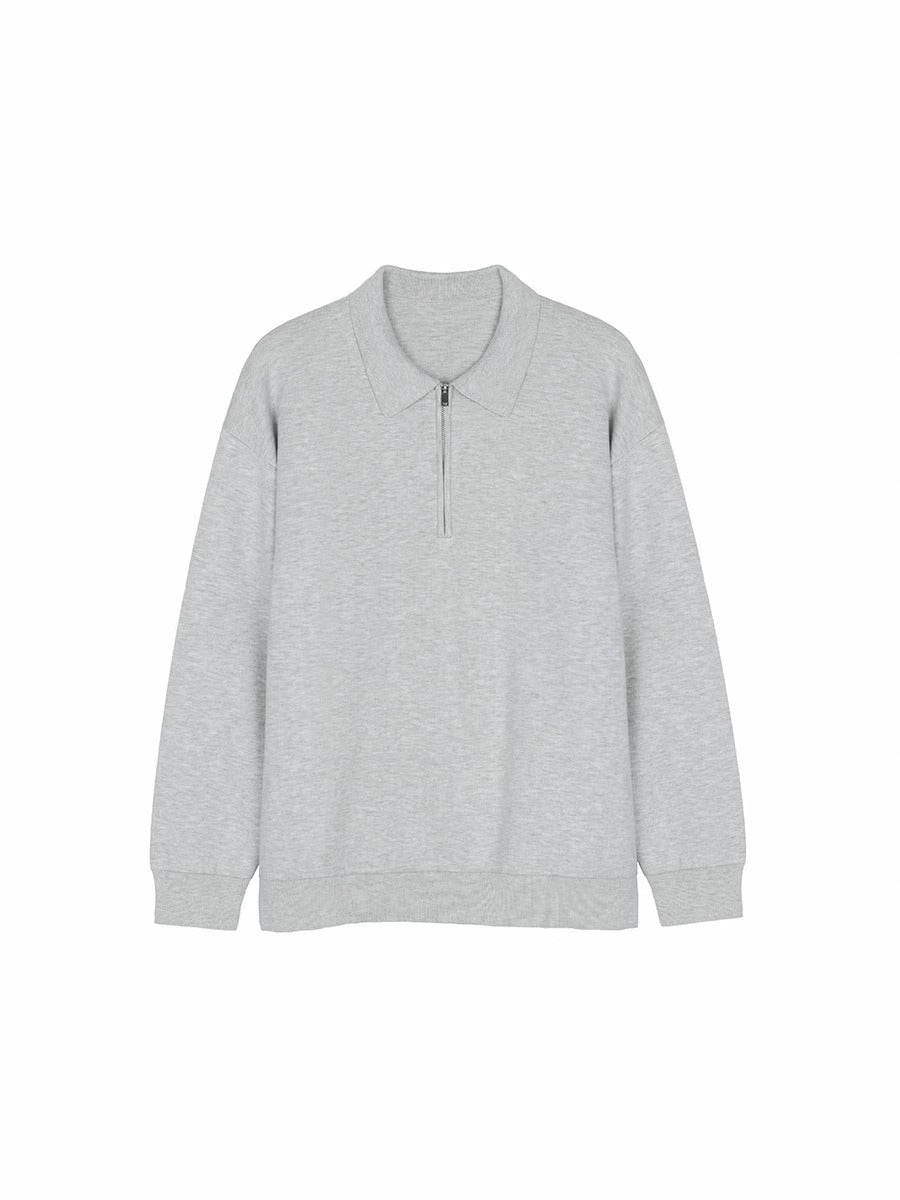 Szara bluza polo unisex z kołnierzykiem. Luźny krój i swobodny styl na co dzień. Bawełniana, bardzo komfortowa.