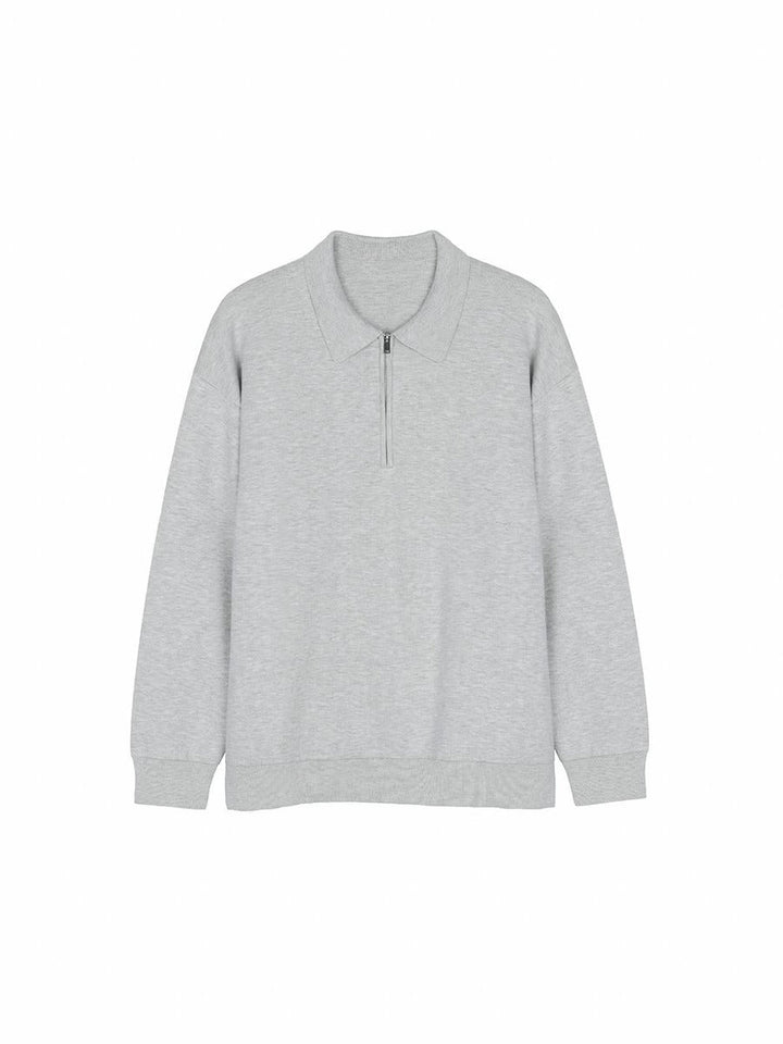Szara bluza polo unisex z kołnierzykiem. Luźny krój i swobodny styl na co dzień. Bawełniana, bardzo komfortowa.