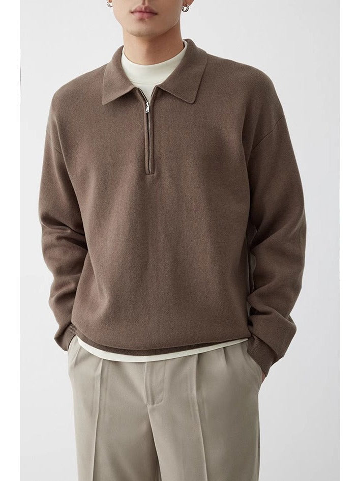 Bawełniana bluza polo unisex z kołnierzykiem. Luźny krój zapewnia swobodę i komfort na co dzień.