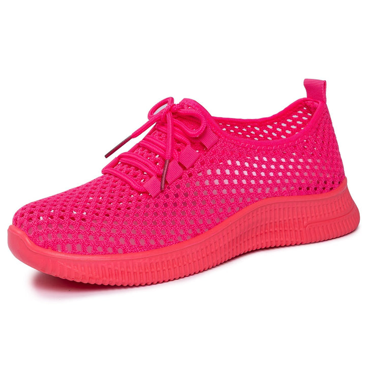 Kolorowe damskie sneakersy slip-on. Wygodne i lekkie obuwie, idealne do miejskich stylizacji na lato.