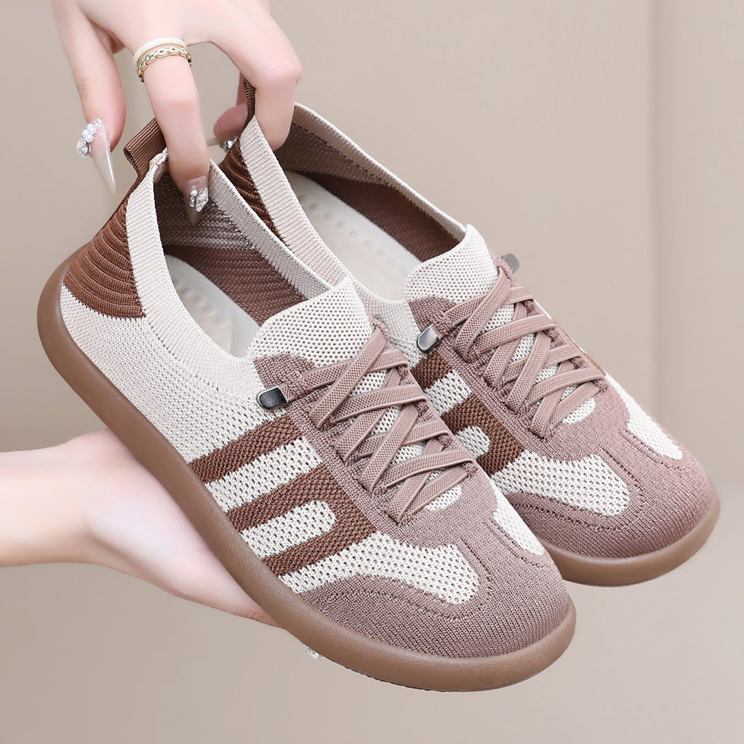Oddychające damskie sneakersy z bezszwową dzianiną, zapewniające komfort i styl miejski.