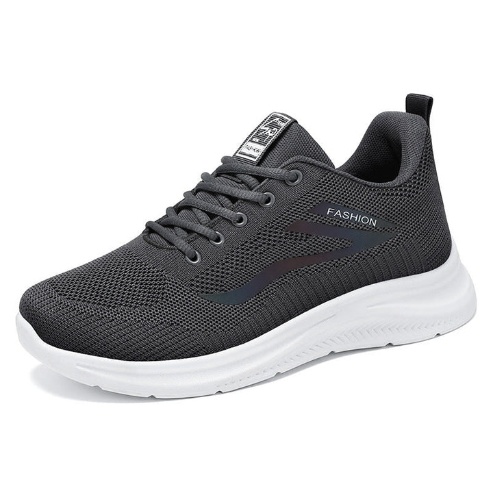 Boczne ujęcie lekkich sneakersów unisex z widoczną amortyzacją i antypoślizgową podeszwą, buty miejskie.