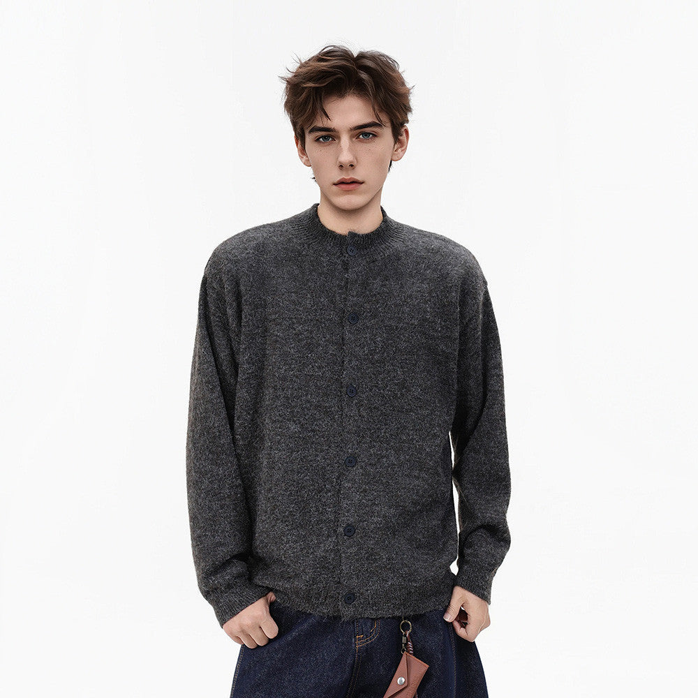 Elegancki męski kardigan dzianinowy oversize z guzikami, idealny do warstwowych jesiennych outfitów.