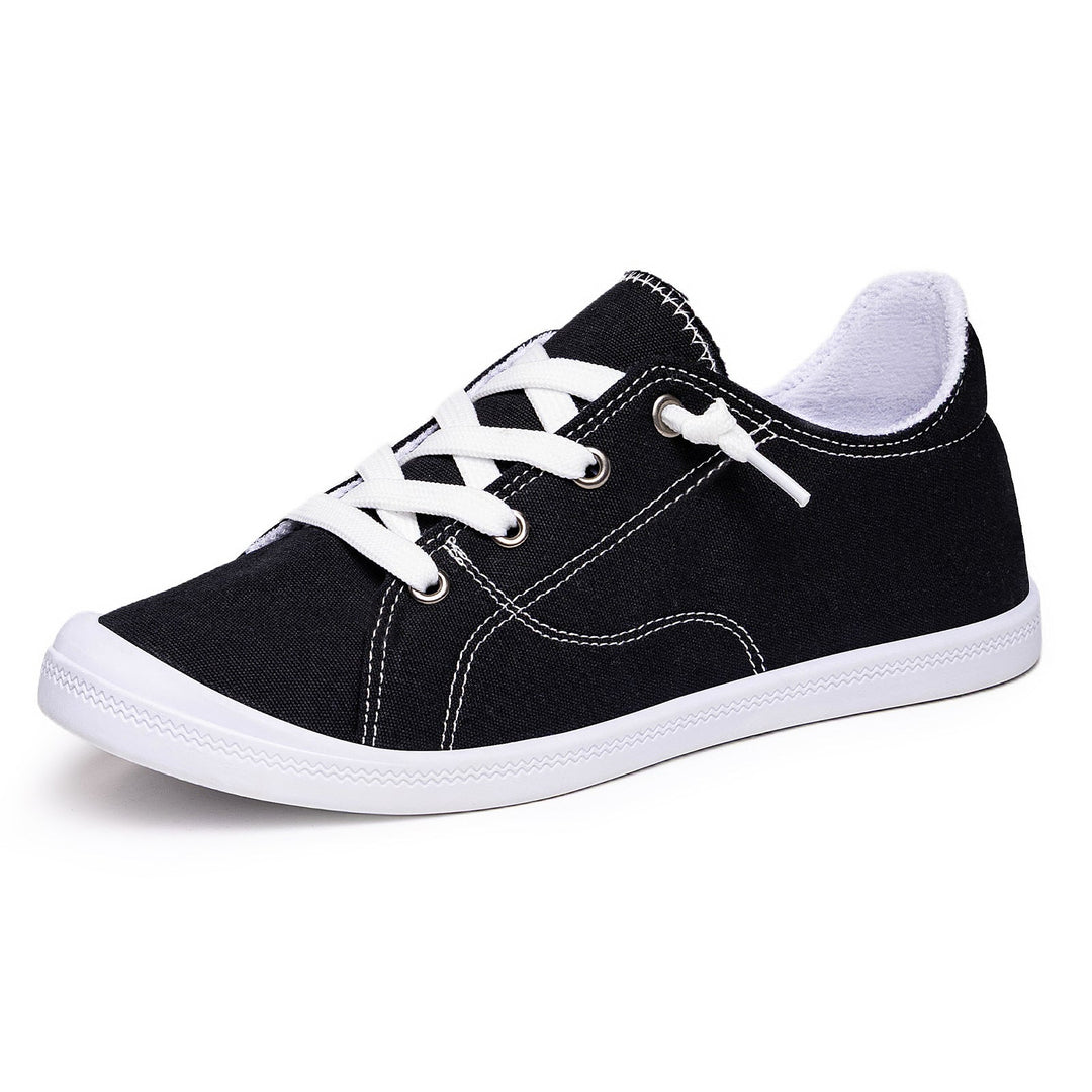 Nowoczesne damskie sneakersy low top. Wygodne obuwie miejskie z gumową podeszwą.