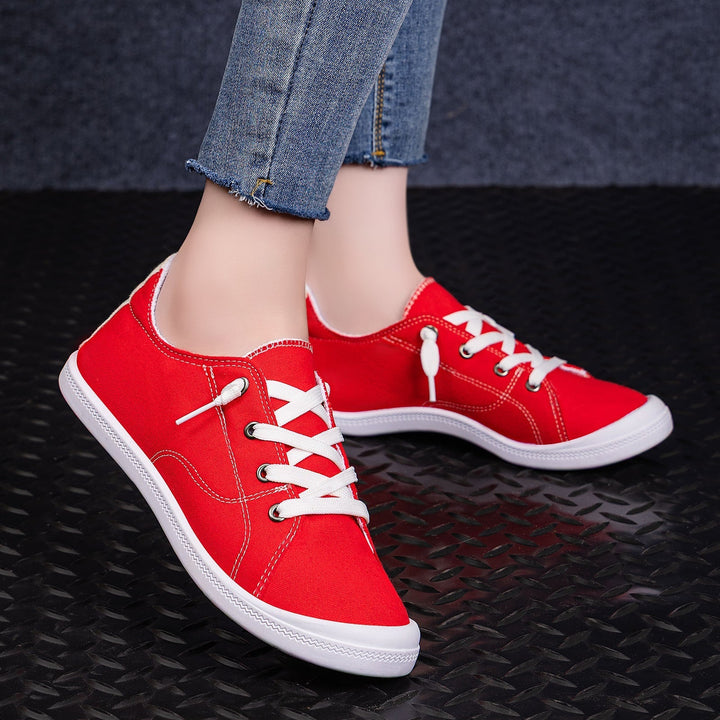 Wygodne damskie sneakersy low top do stylizacji miejskich. Trwała gumowa podeszwa.