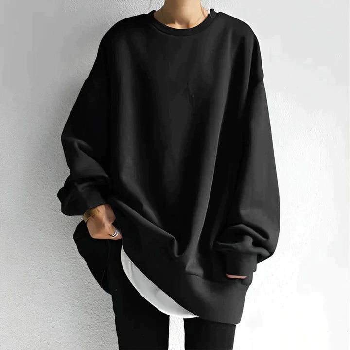Damski sweter oversize z dzianiny, luźny krój, okrągły dekolt. Idealny na jesień/zimę, modny i komfortowy.