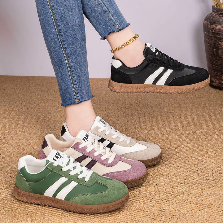Widok z boku na męskie sneakersy retro. Sportowe buty męskie z profilowaną podeszwą i modnym designem.