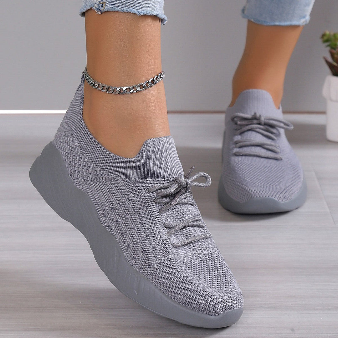 Damskie obuwie sportowe, wsuwane sneakersy z falistą podeszwą na cały dzień.