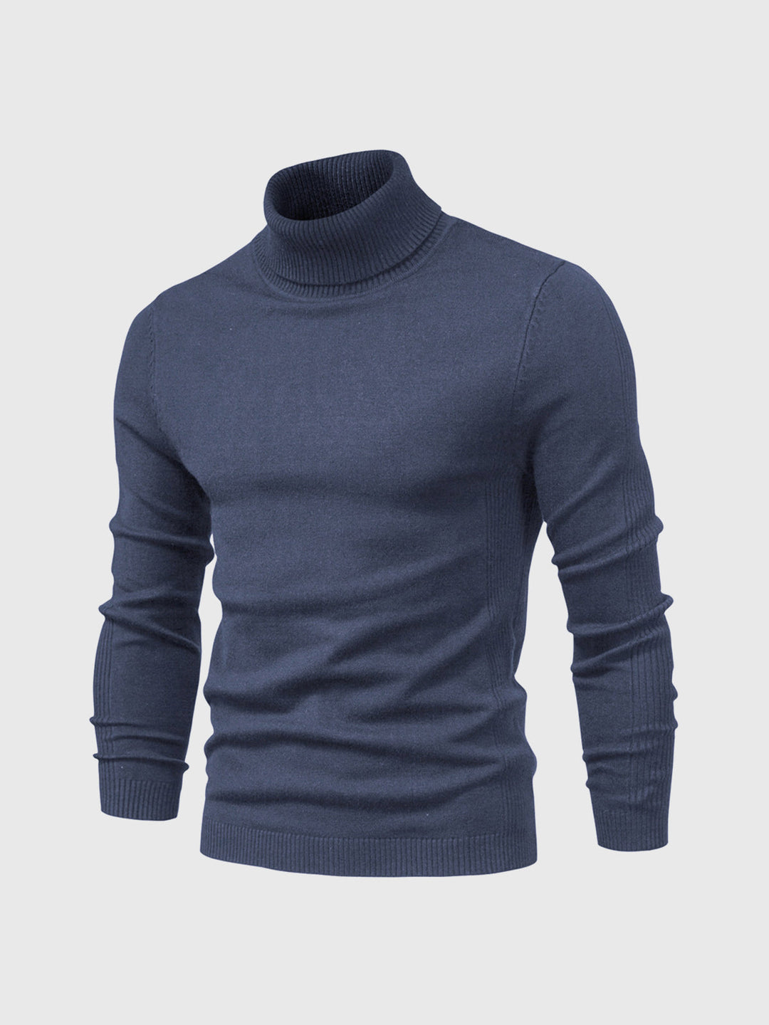 Golf męski Adrien w ruchu. Model prezentuje sweter, podkreślając jego krój i dopasowanie do sylwetki.