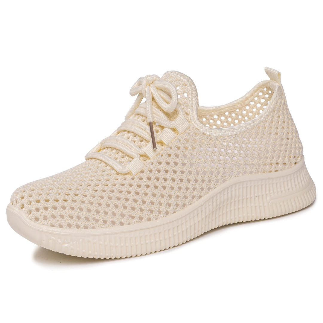 Minimalistyczne damskie sneakersy slip-on. Lekkie, przewiewne i komfortowe – idealne na spacer.
