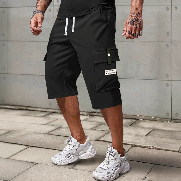 Wygodne męskie szorty cargo ze sznurkiem, idealne na lato, wiosnę. Świetne do casualowych i sportowych stylizacji.