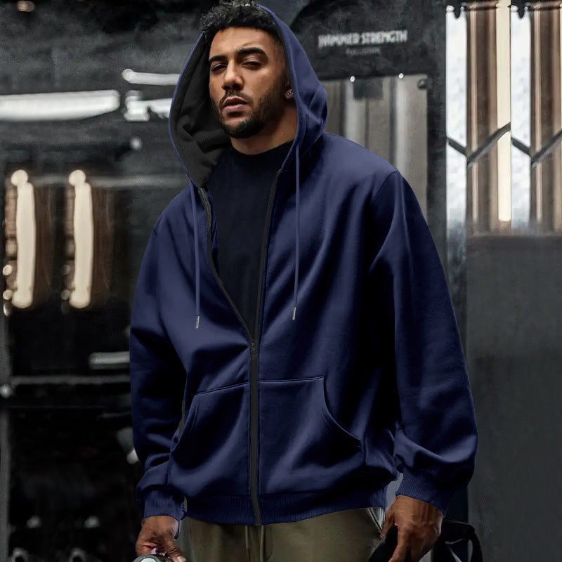 Bluza męska oversize z kapturem i zamkiem, z dużą kieszenią kangurką. Casualowy komfort.