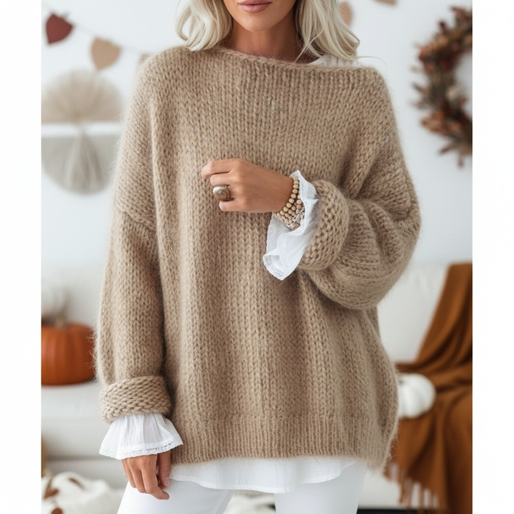 Oversize'owy sweter damski Leonie, idealny na jesień i wiosnę. Komfortowy, luźny krój dla casualowych stylizacji.