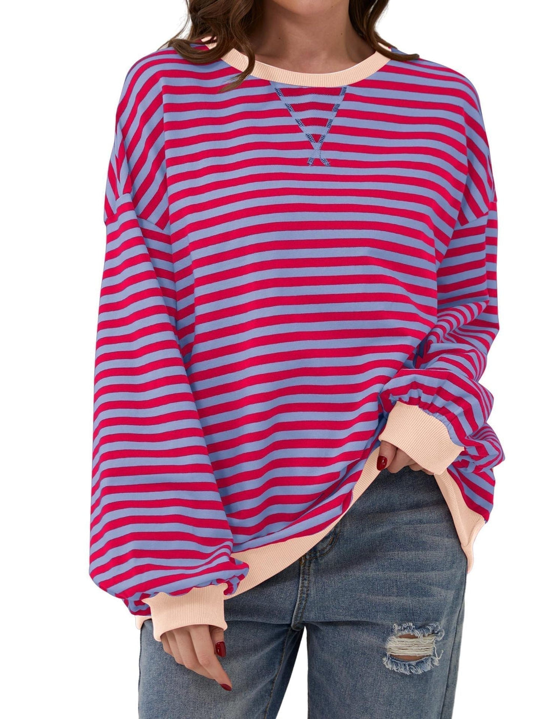 Damska bluza oversize w paski, okrągły dekolt. Modna, wygodna, idealna na casual jesienią i wiosną.