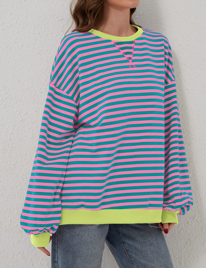 Damska bluza Holly w paski, oversize, z długim rękawem i okrągłym dekoltem. Swobodny, casualowy styl.