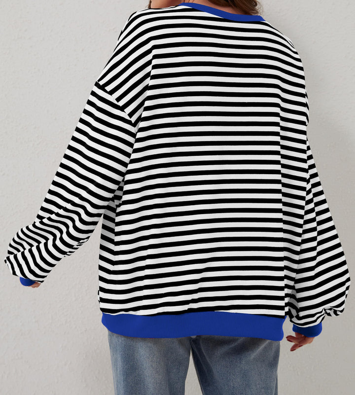Damska bluza Holly oversize w paski, okrągły dekolt, długi rękaw. Wygodna, swobodny krój, casual.