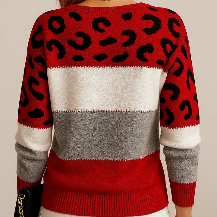 Elegancki sweter damski panterka: luźny krój, wzór zwierzęcy, komfort i styl na jesień/zimę.