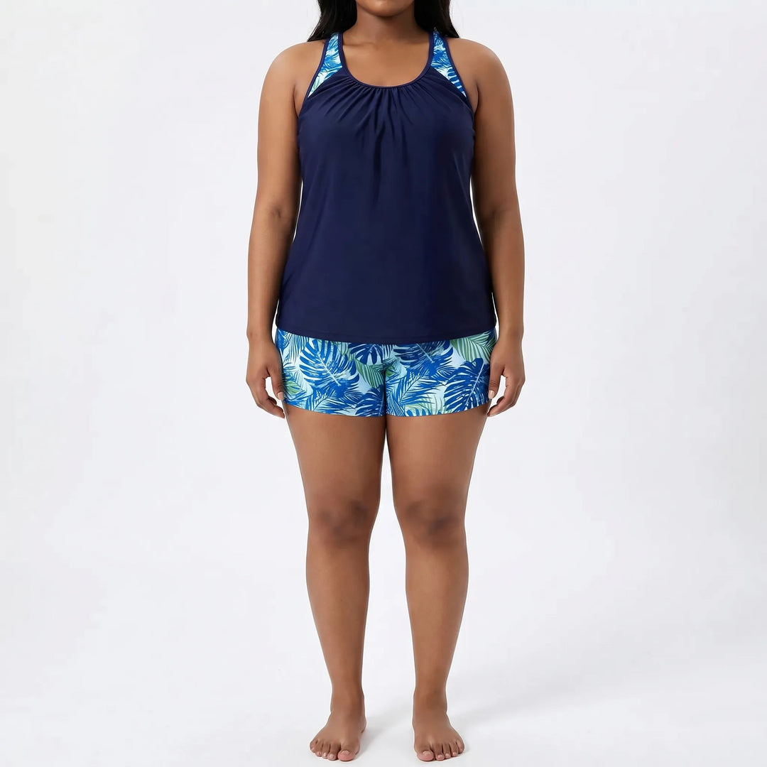 Damski kostium kąpielowy plus size ze wzorem tropikalnym. Idealny na wakacje i relaks nad wodą.