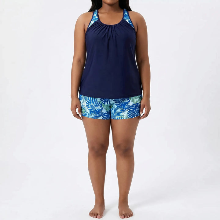 Damski kostium kąpielowy plus size ze wzorem tropikalnym. Idealny na wakacje i relaks nad wodą.