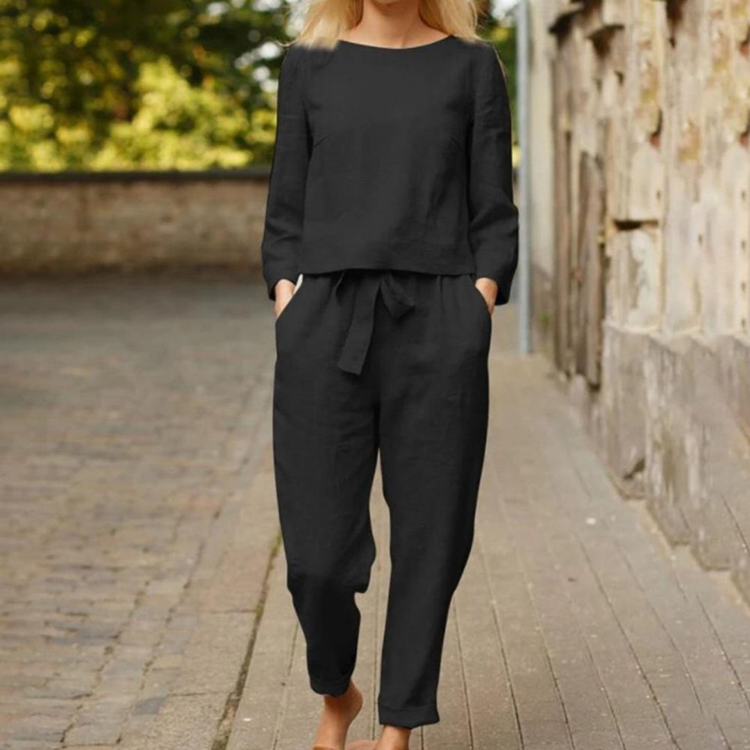Elegancki dwuczęściowy komplet damski z długim rękawem, idealny na wiosnę i jesień. Stylowy strój casual.