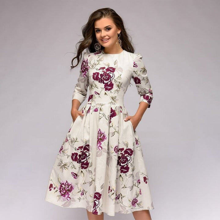 Damska sukienka retro Florina midi z eleganckim kwiatowym wzorem, idealna na co dzień i okazje.