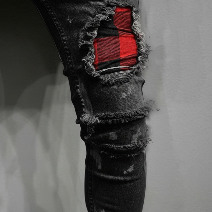 Wygodne męskie spodnie jeansowe slim fit z przetarciami, doskonałe na co dzień, łączące komfort z modnym designem.