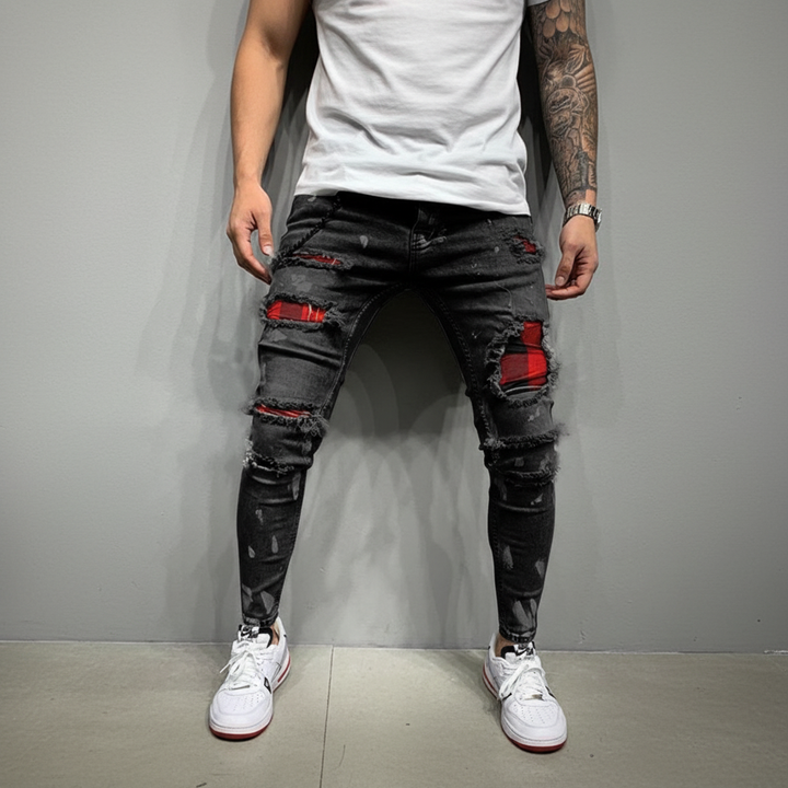 Jeansy męskie William slim fit z oryginalnymi przetarciami, idealne dla mężczyzn ceniących casualowy styl i modę.