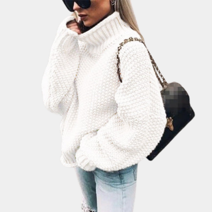 Ciepły, modny sweter damski na zimę. Idealny do casualowych i eleganckich stylizacji, zapewni komfort i styl.
