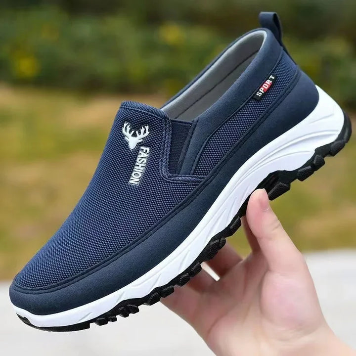 Sportowe męskie buty wsuwane, czarne, oddychające. Komfortowe na co dzień i spacery.
