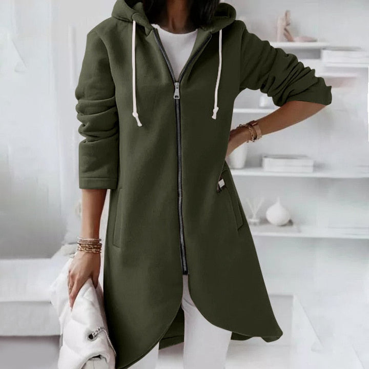 Wygodna damska kamizelka casual z kapturem. Zamek błyskawiczny i modny design na jesień/zimę.